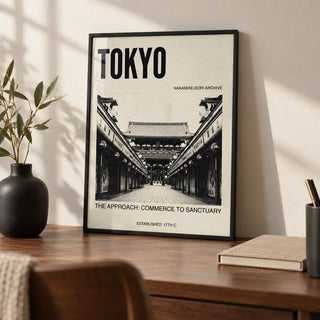 Nakamise Dori Art Print, a small A4 framed print leaning on a walnut writing desk