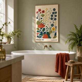 Nature Artwork, framed on the wall of a calm bathroom with a plain soft green wall and a white bath