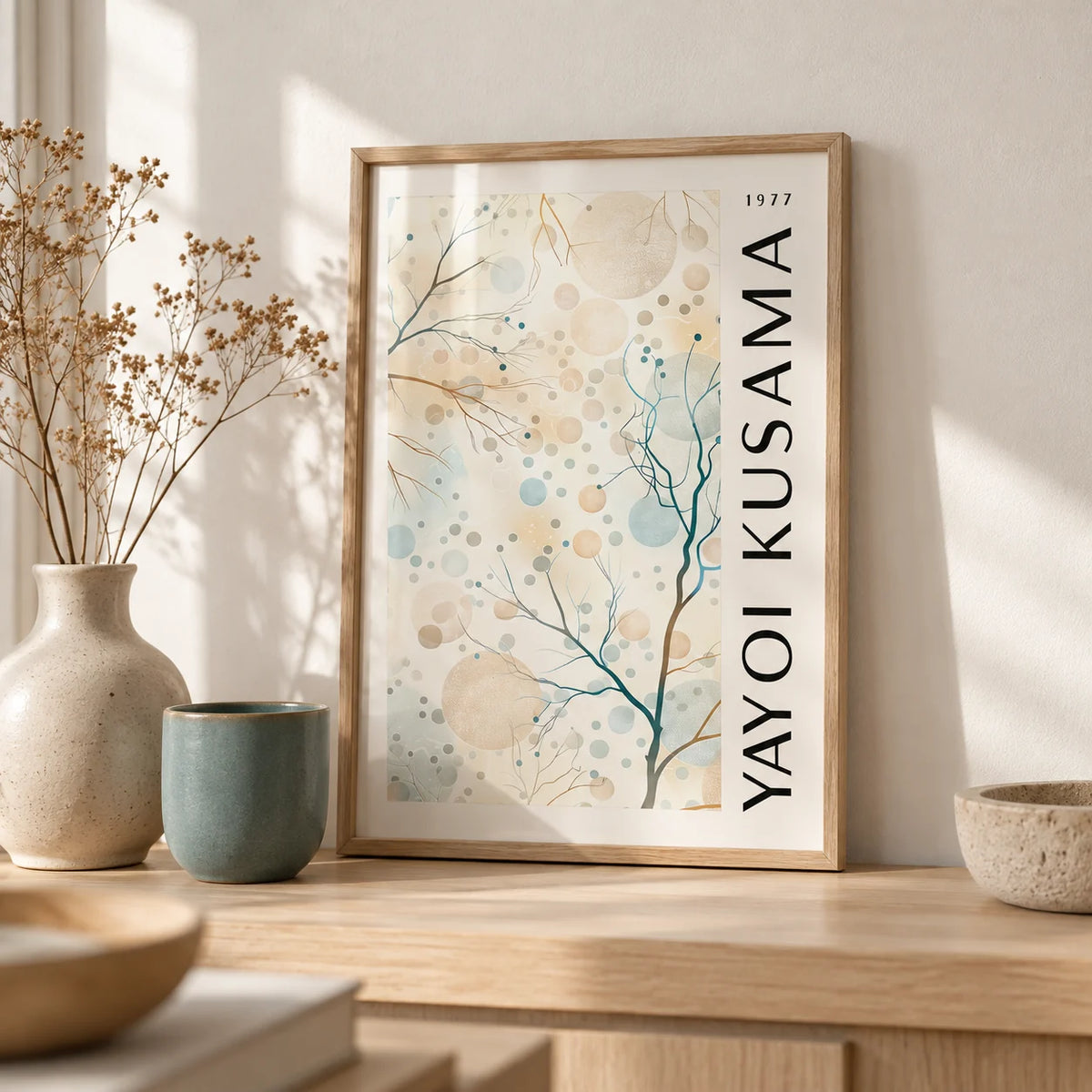 Nature Prints, a small A4 framed print leaning on a pale oak shelf in a living room