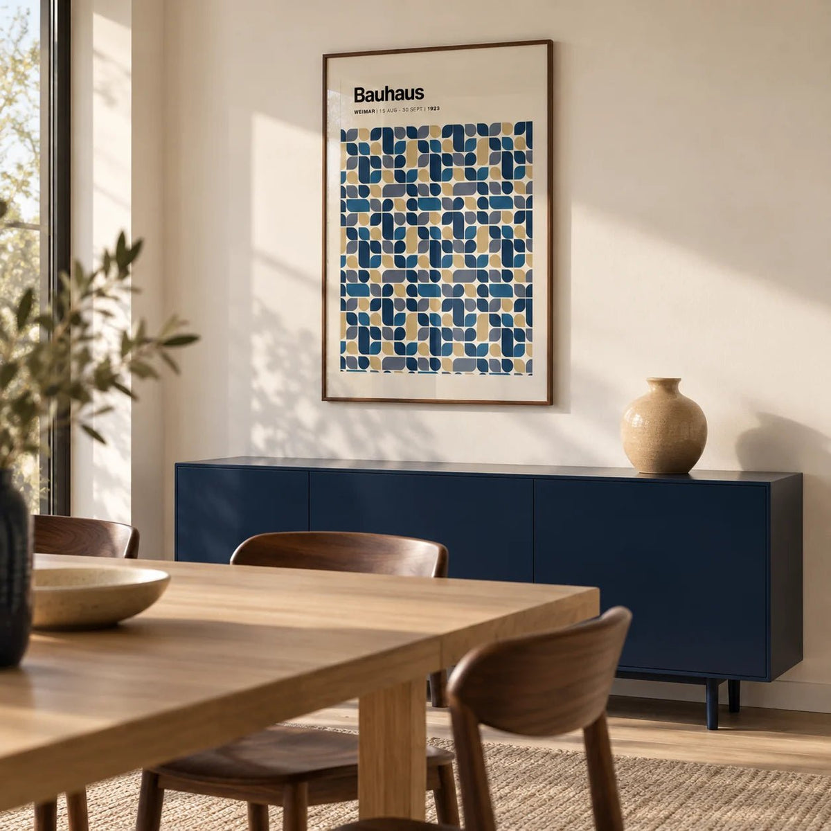 Navy and Gold Wall Art, framed on the wall of a modern dining room