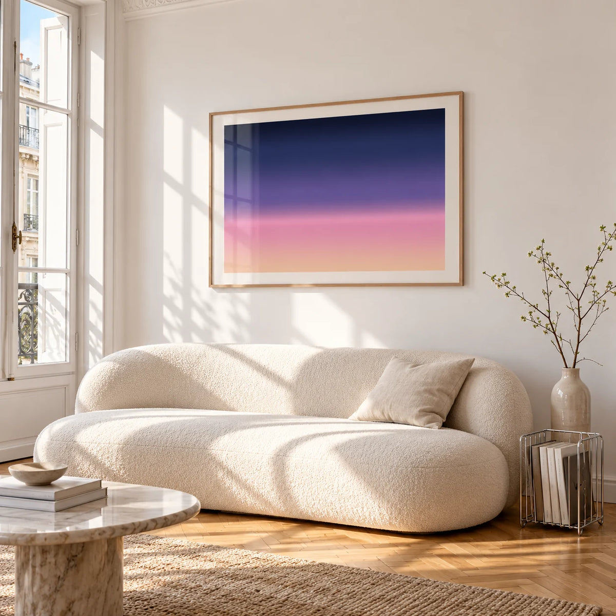 Navy and Pink Wall Art, framed on the wall of a bright living room corner