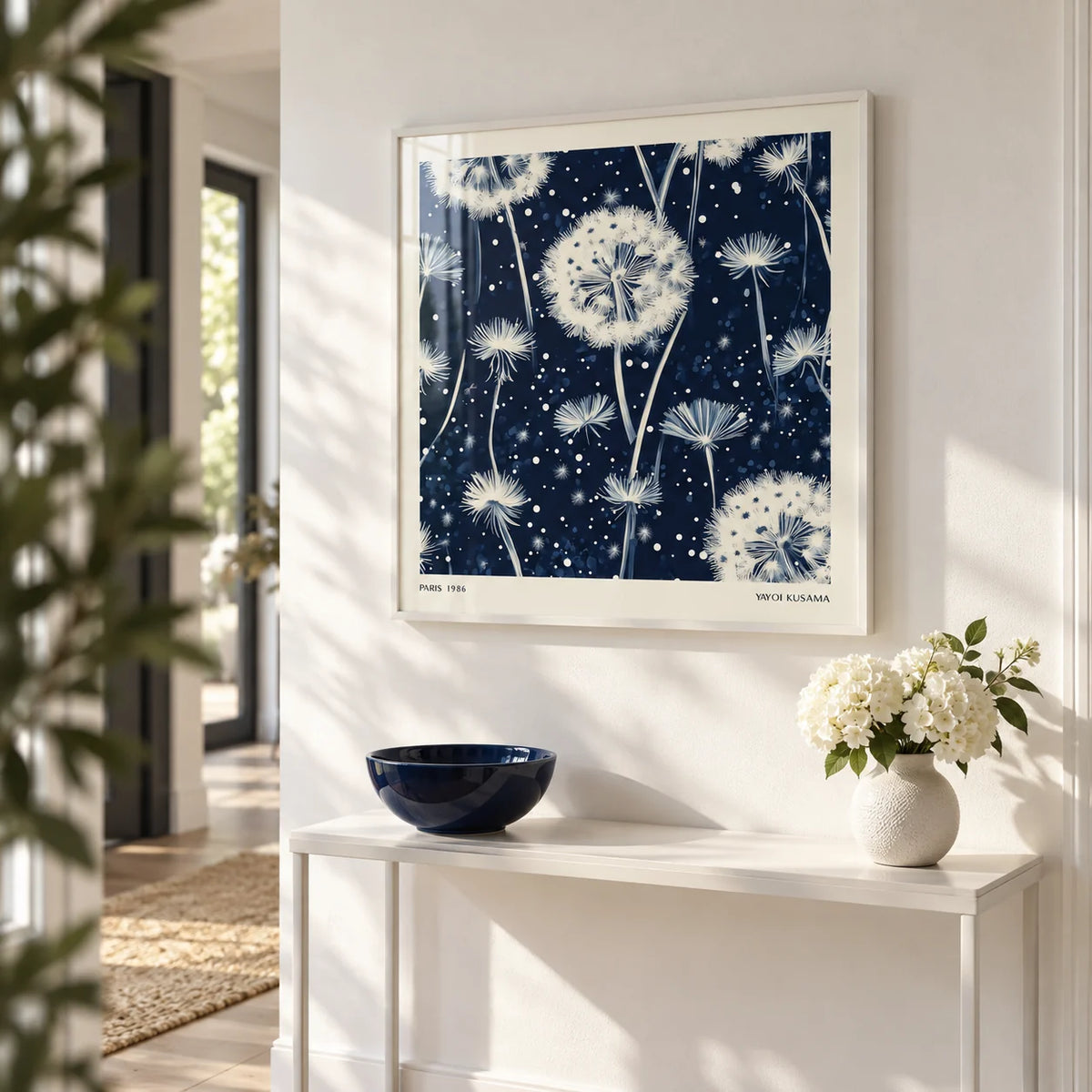 Navy and White Wall Art, framed on the wall of a bright hallway with a white wall