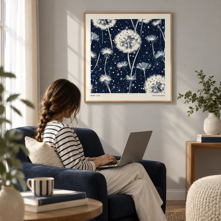 Navy and White Wall Art, framed on the wall of a calm reading corner with a soft grey wall in a living room