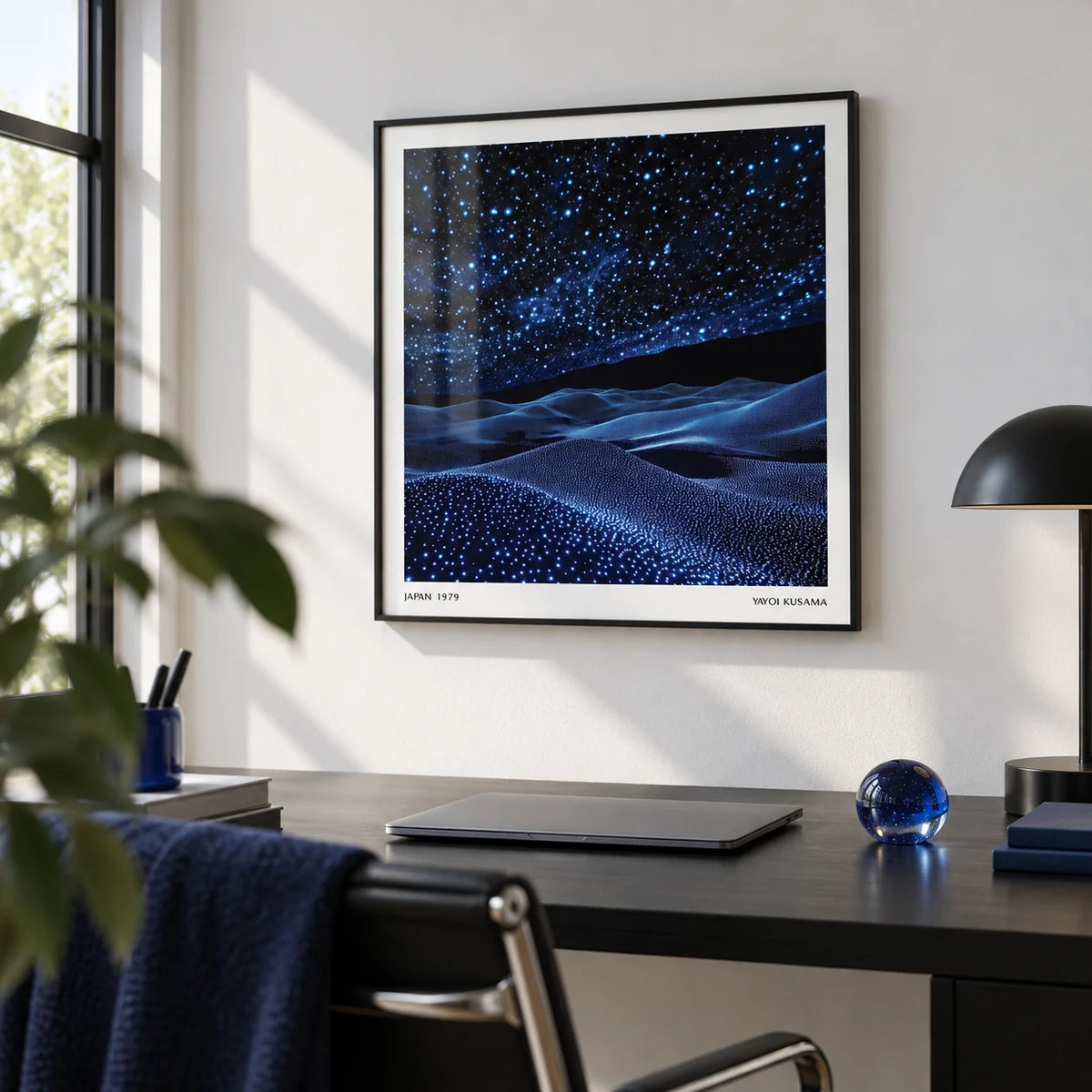 Navy Blue Artwork, framed on the wall of a modern home office with a white wall