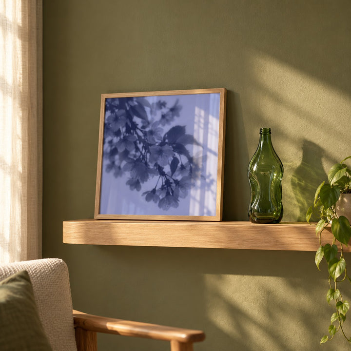Navy Cherry Blossom Print styled on a shelf against a green wall (frame not included)
