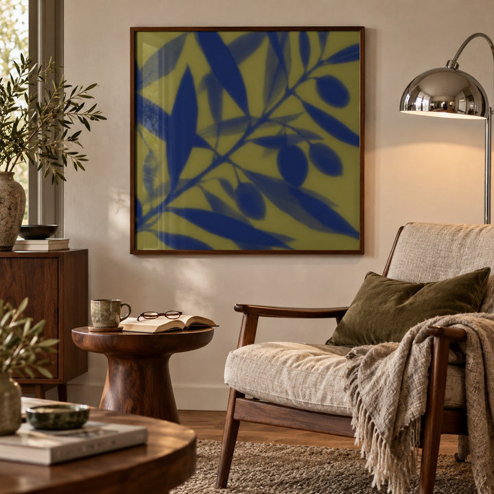 Navy Olive Branch Print styled in a reading corner (frame not included)