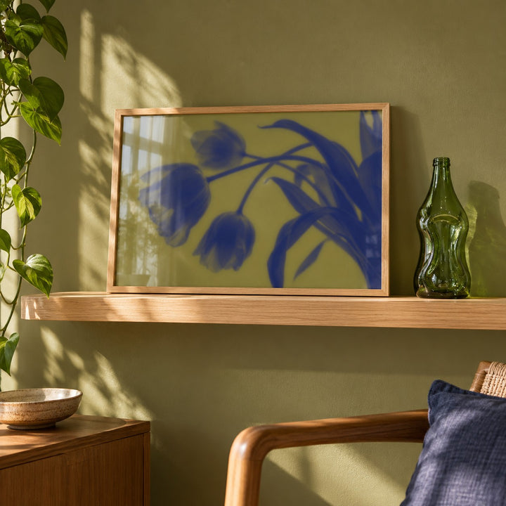 Navy Tulip Print styled on a shelf against a green wall (frame not included)