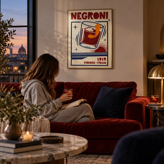 Negroni Cocktail Print, framed on the wall of a elegant living room at dusk