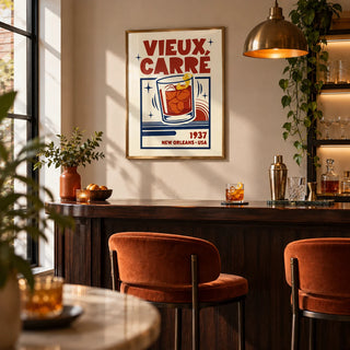 New Orleans Cocktail Print, framed on the wall of a small home bar in a kitchen