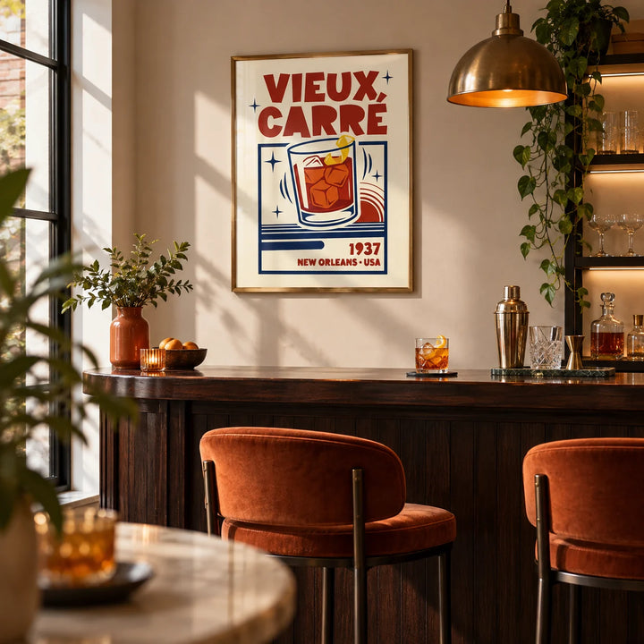 New Orleans Cocktail Print, framed on the wall of a small home bar in a kitchen