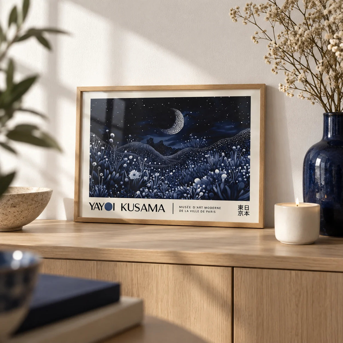 Night-Art, a small A4 framed print leaning on a pale oak sideboard in a living room