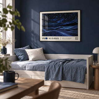 Night Sky Wall Art, framed on the wall of a calm single guest room with a deep navy painted wall