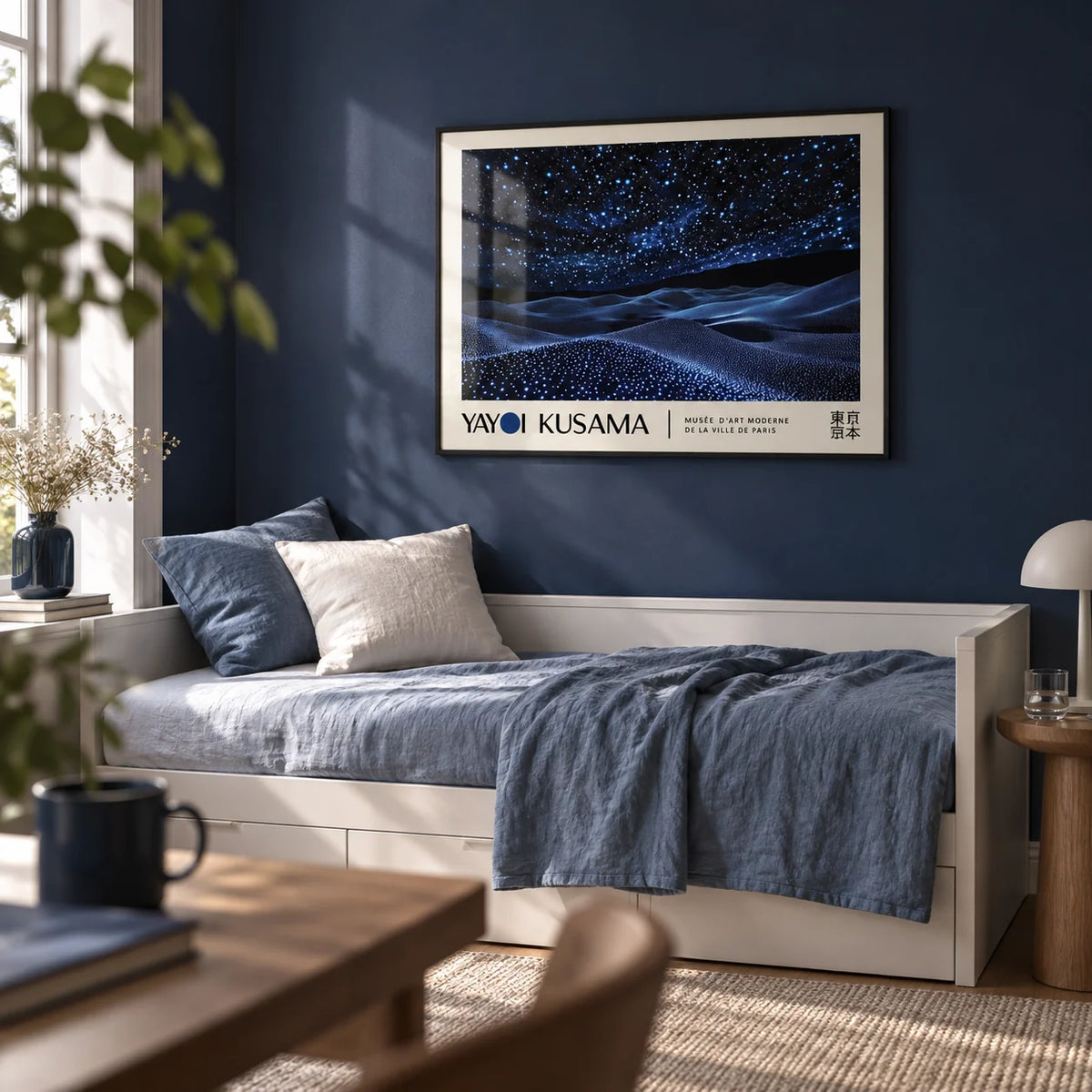 Night Sky Wall Art, framed on the wall of a calm single guest room with a deep navy painted wall