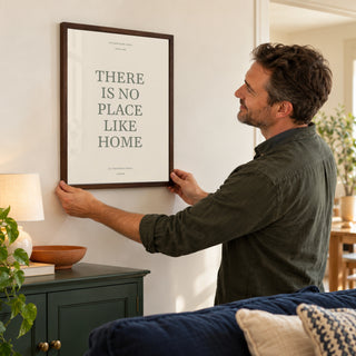 No Place Like Home in a placing the print at home, dark wood frame