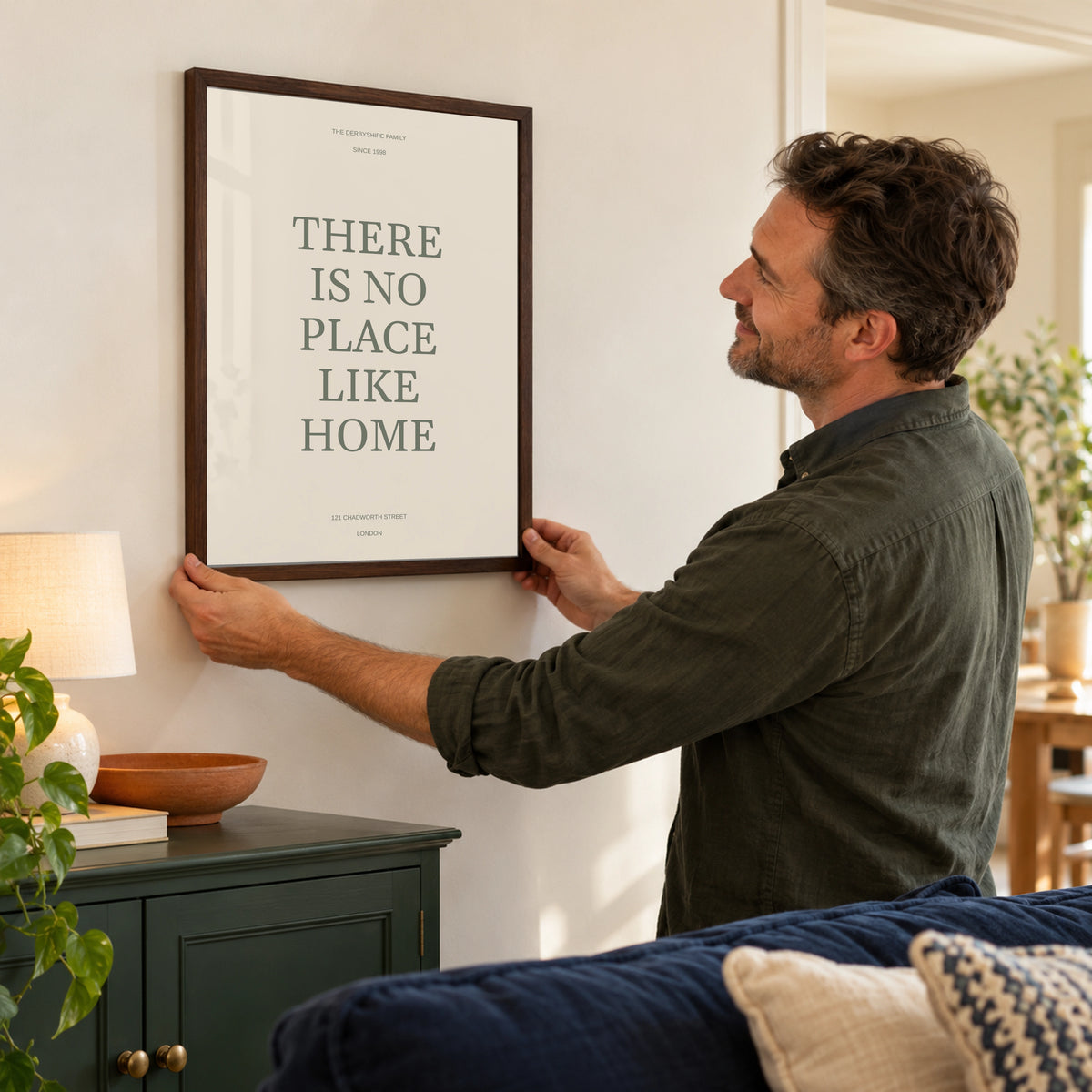 No Place Like Home in a placing the print at home, dark wood frame
