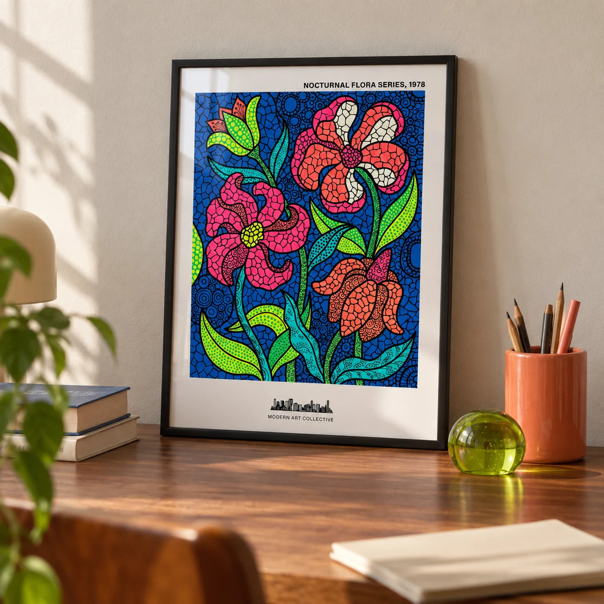 Nocturnal Floral Art Print, a small A4 framed print leaning on a walnut desk