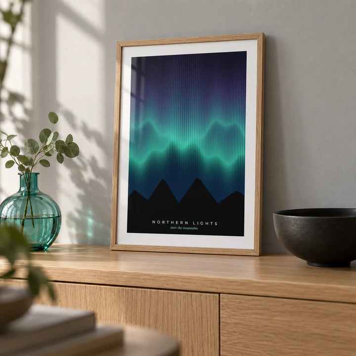 Nordic Wall Art, a small A4 framed print leaning on a pale oak sideboard in a living room