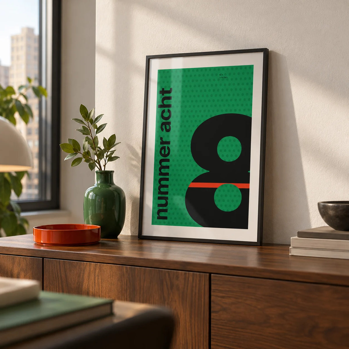Number 8 Print, a small A4 framed print leaning on a walnut sideboard in a living room