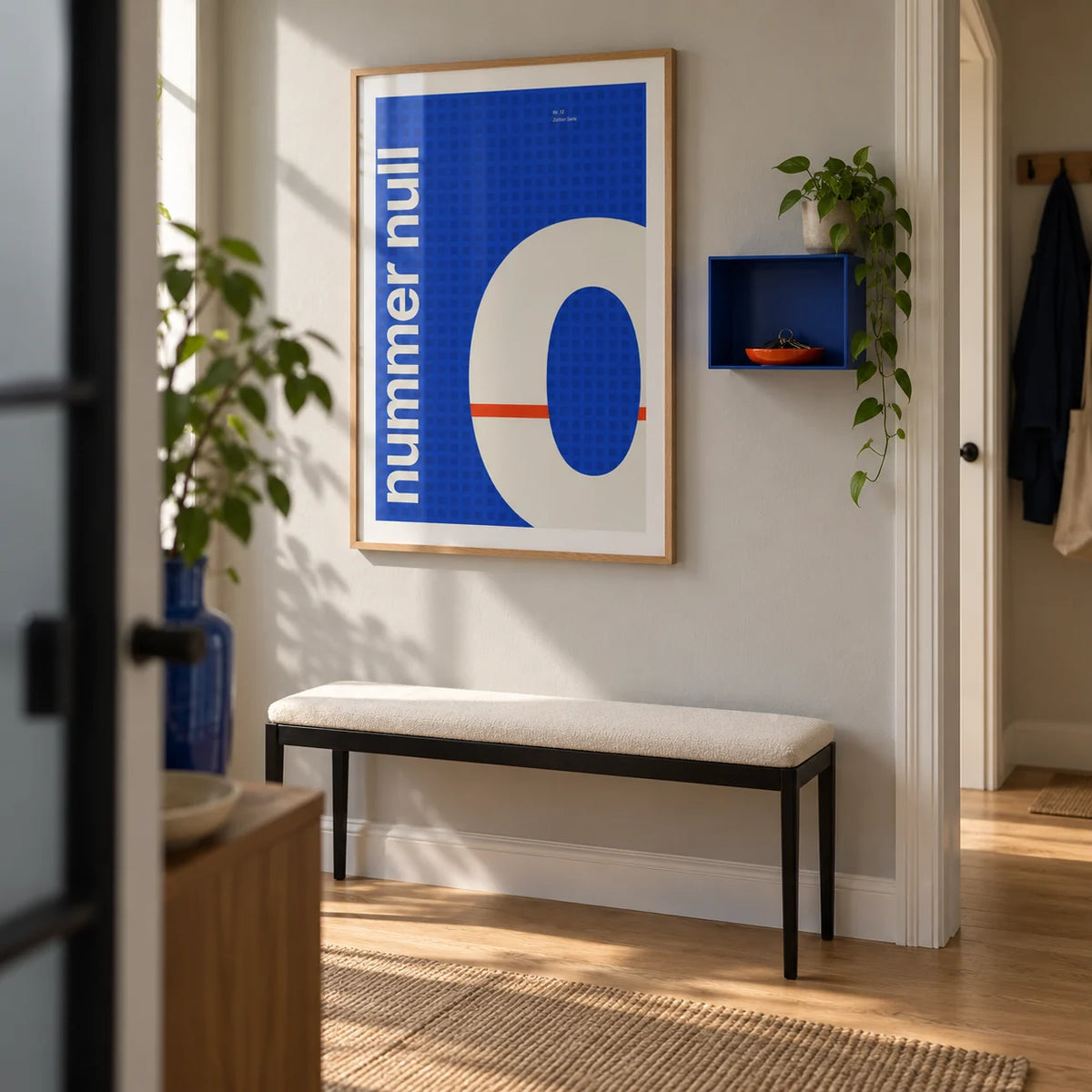 Number Print, framed on the wall of a modern entrance hallway in a UK first flat for a design enthusiast (24-30)