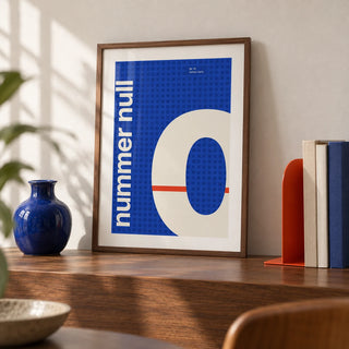 Number Print, a small A4 framed print leaning on a walnut shelf in a living room