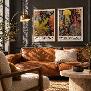 Octopus and Jellyfish Wall Art Set of 2 styled above a cognac leather sofa on a charcoal limewash wall: Golden Tentacle and Luminous Drift shown framed side by side (frames not included)