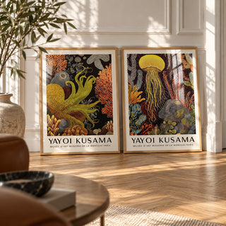 Octopus and Jellyfish Wall Art Set of 2 styled leaning against a white panelled wall on herringbone parquet: Golden Tentacle and Luminous Drift shown framed side by side (frames not included)