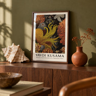 Octopus Wall Art, a small A4 framed print leaning on a walnut shelf in a living room