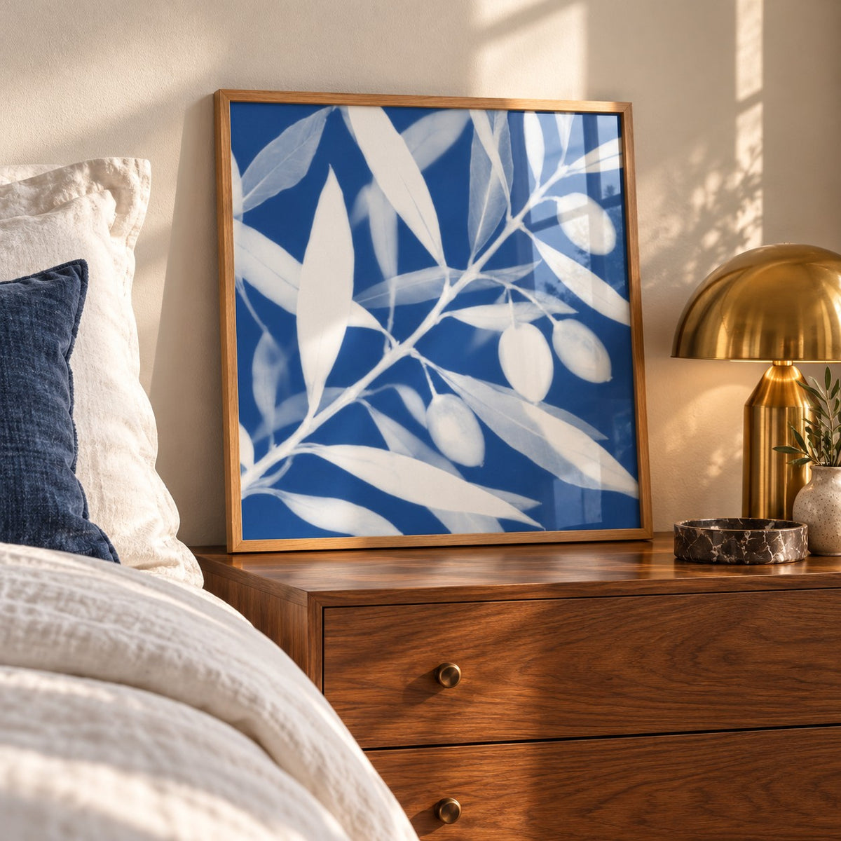 Olive Branch Cyanotype Print styled on a bedside chest (frame not included)