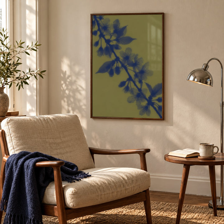Olive Cherry Blossom Print styled in a reading corner (frame not included)