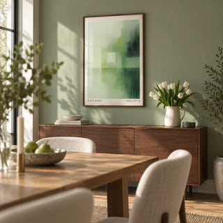 Olive Green Wall Art, framed on the wall of a soft modern dining room with a sage green painted wall