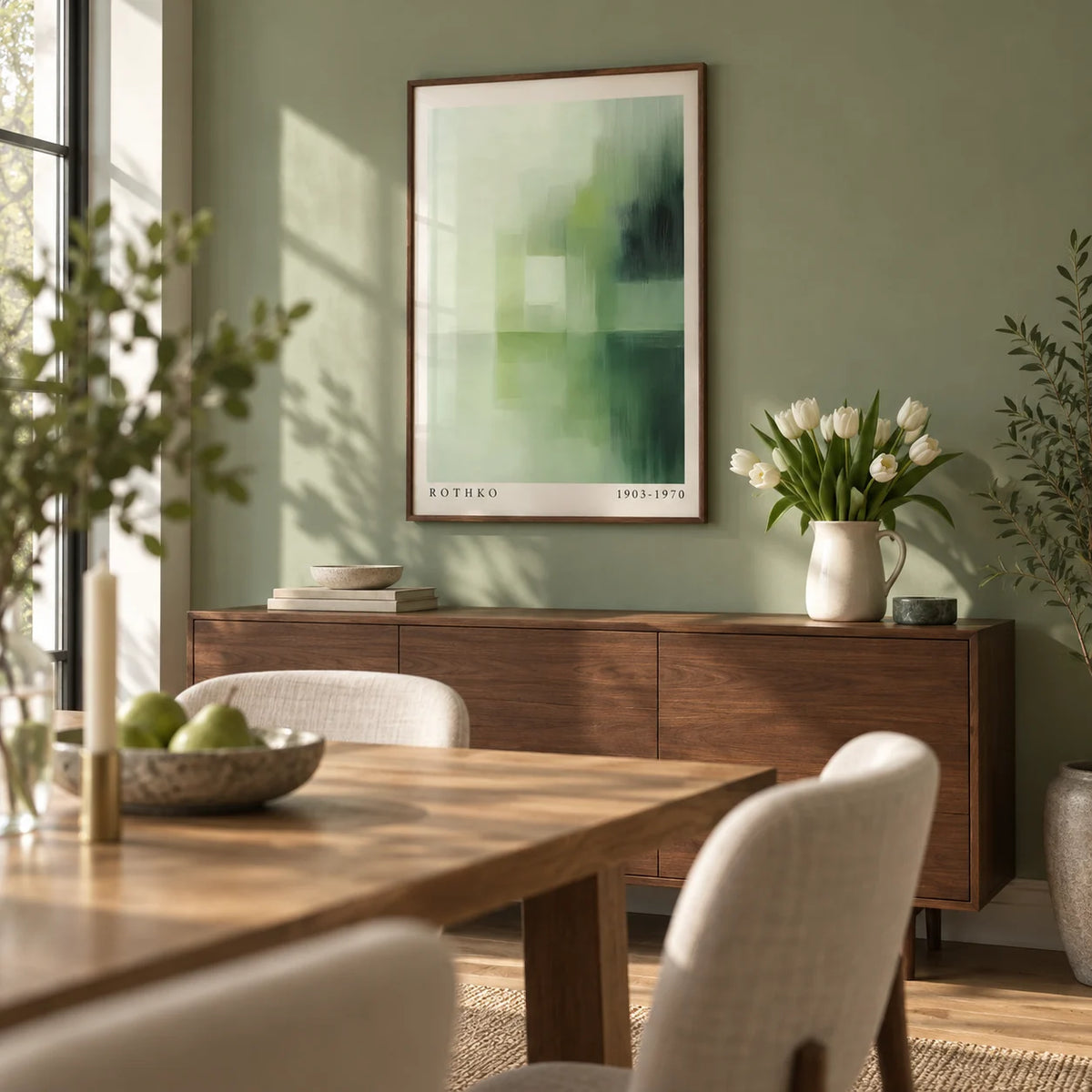 Olive Green Wall Art, framed on the wall of a soft modern dining room with a sage green painted wall