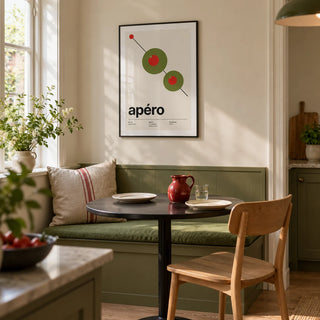 Olive Print, framed on the wall of a bright eat-in kitchen breakfast nook in a UK maisonette with a cream wall and a built-in olive green bench