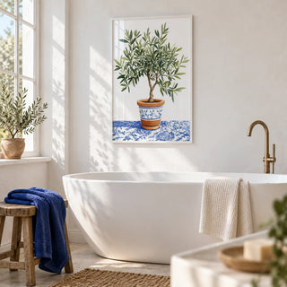 Olive Tree Art Print, framed on the wall of a bright white bathroom with a plaster wall