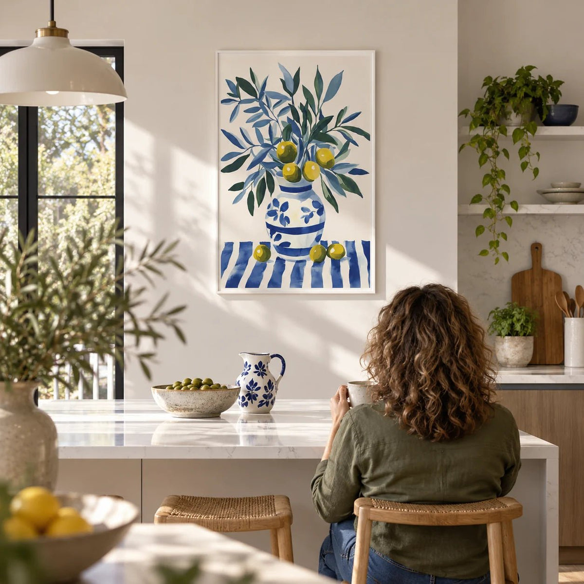 Olive Tree Wall Art, framed on the wall of a bright open kitchen
