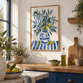 Olive Tree Wall Art, framed on the wall of a Mediterranean kitchen with white plaster walls