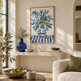 Olive Tree Wall Art, framed on the wall of a Mediterranean-style living room with a limewashed wall