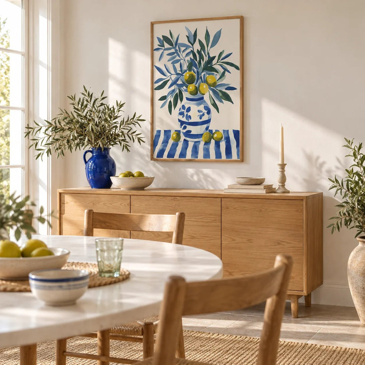 Olive Tree Wall Art, framed on the wall of a sunny dining room