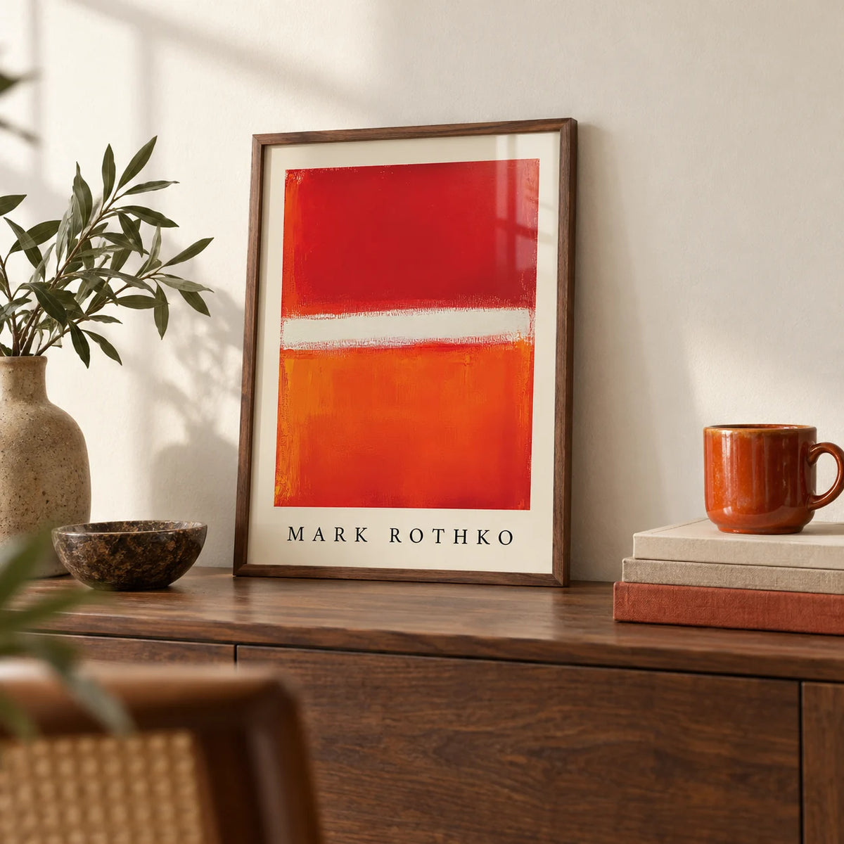 Orange Abstract Art, a small A4 framed print leaning on a walnut shelf in a living room