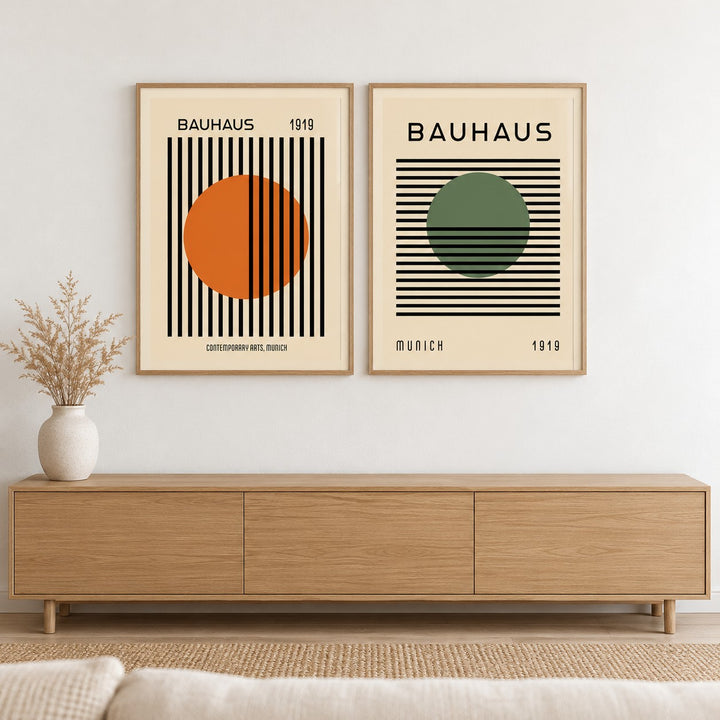 Orange and Green Wall Art Set of 2 hung at eye level above a light oak sideboard: Striped Sun and Modern Orb shown framed side by side (frames not included)