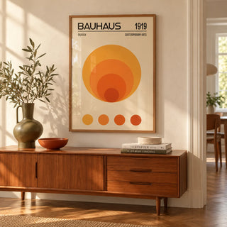 Orange Bauhaus Poster, framed on the wall of a bright mid-century hallway