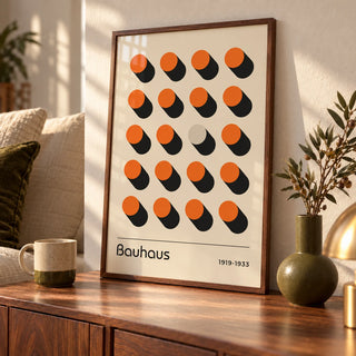 Orange Poster, an A3 framed print leaning on a walnut sideboard in a living room