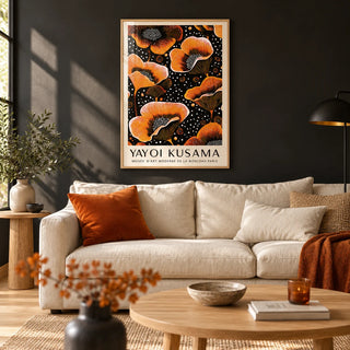 Orange Print, framed on the wall of a bold living room with a soft black painted wall and a light oak floor
