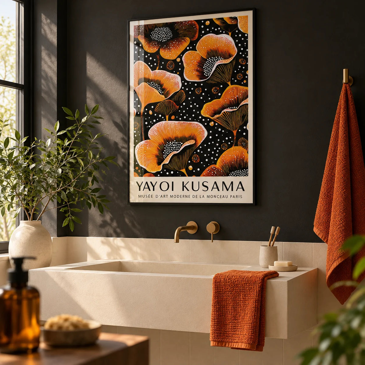 Orange Print, framed on the wall of a modern bathroom with a charcoal black wall and plain cream tiles