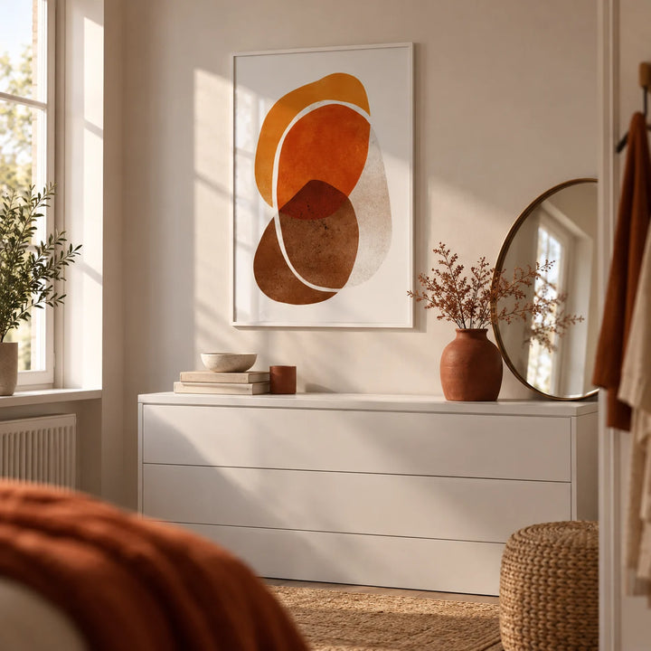 Orange Shapes Art Print, framed on the wall of a calm dressing area