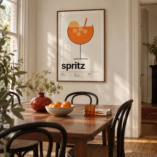 Orange Spritz Print, framed on the wall of a design-led dining room in a Victorian terrace with warm white walls and oak floorboards