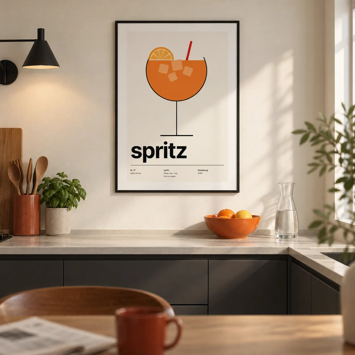 Orange Spritz Print, framed on the wall of a modern kitchen in a UK city flat with cream walls