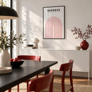 Original Bauhaus Poster, framed on the wall of a modern dining room with a white wall