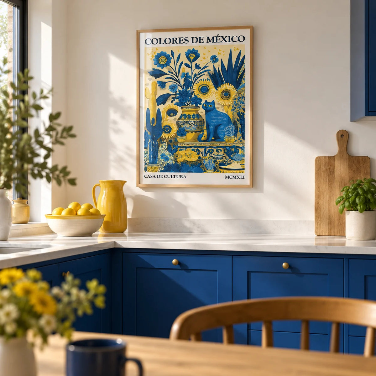 Otomi Wall Art, framed on the wall of a bright kitchen with plain cobalt blue units and a white worktop