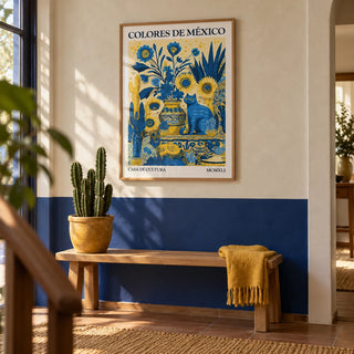 Otomi Wall Art, framed on the wall of a hallway with a plain cobalt blue lower wall and limewashed cream plaster above