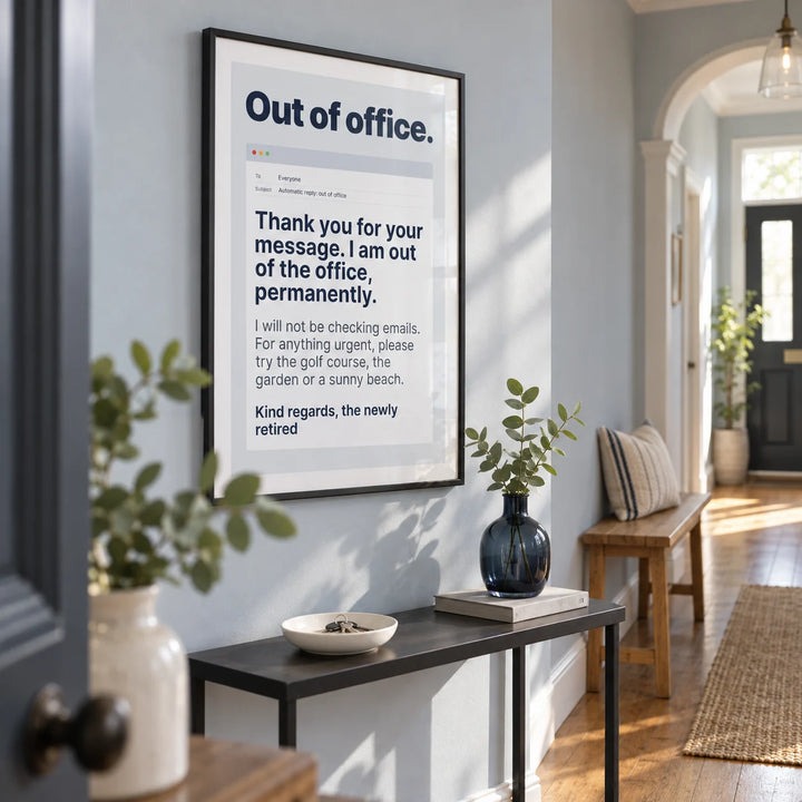 Out of Office Print, framed on the wall of a bright entrance hallway in a modernised UK terrace with a pale blue-grey wall and warm timber floor